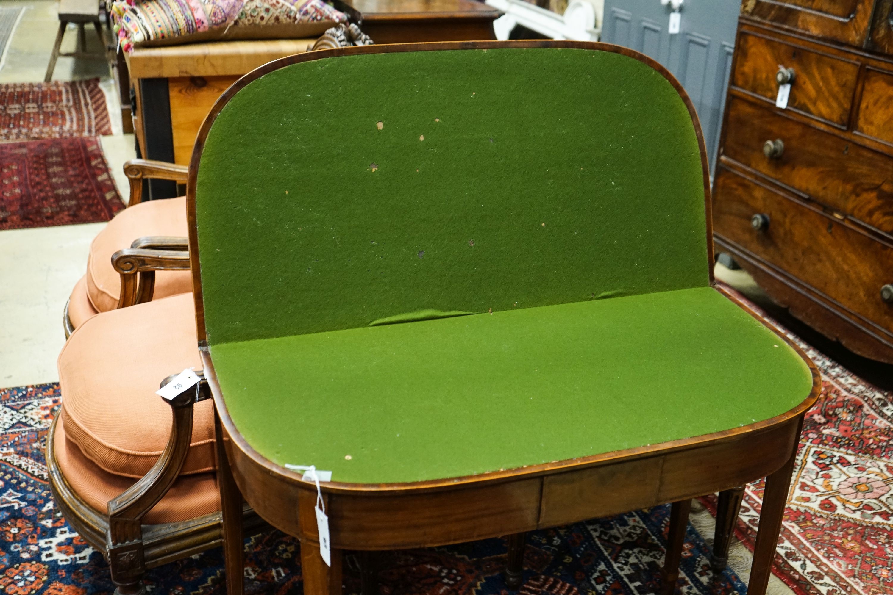 A George III banded mahogany D shaped folding card table, width 91cm, depth 45cm, height 72cm